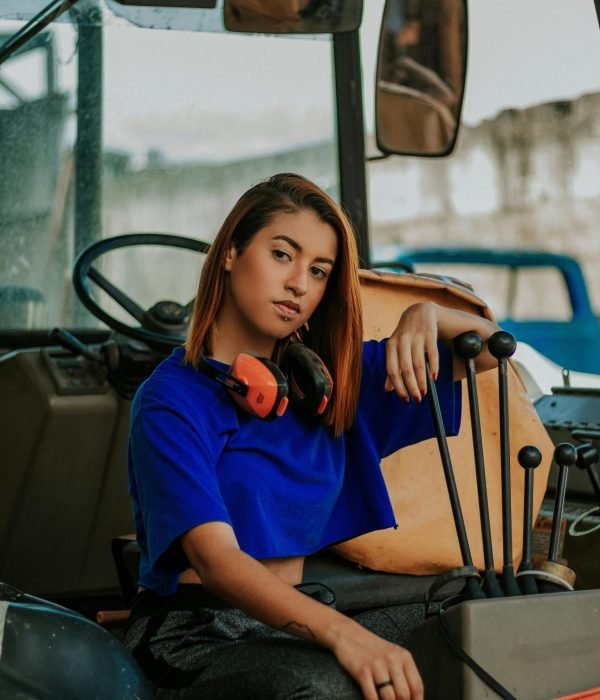 Woman Sitting on Tractor